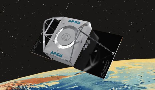 An APEX/Aetherflux-style satellite with solar-panel wings orbiting Earth against a starfield